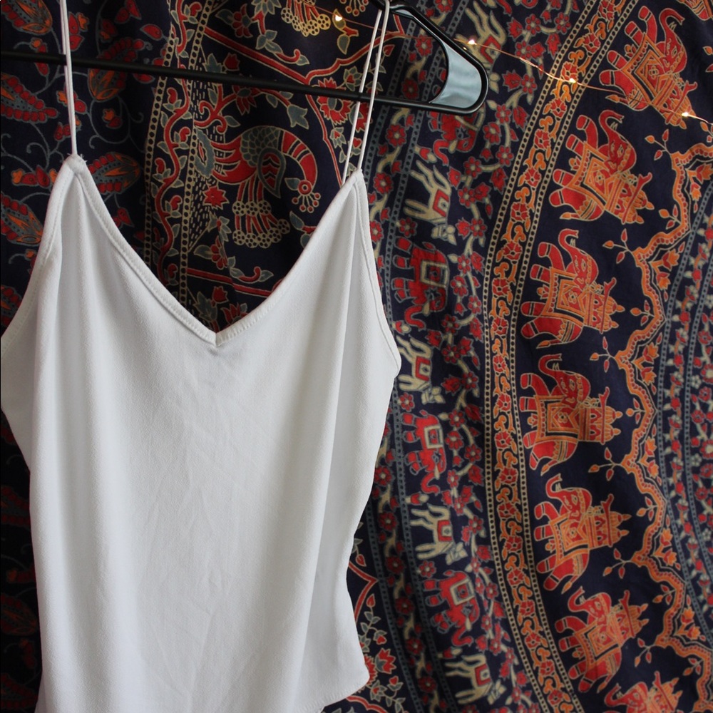 White bodysuit, never worn, no tags